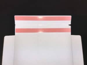 2 way box with two adhesive strips showing by Salazar Packaging
