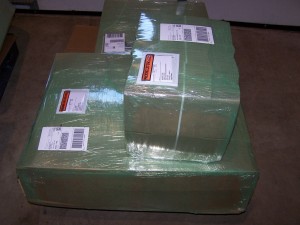 Bundles of Globe Guard boxes wrapped in bio film