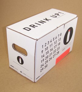 Die cut box with partitions for glass bottles