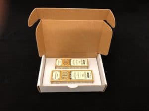 Paperboard inner packaging combined with corrugated outer packaging