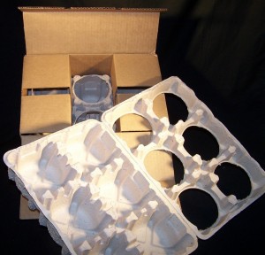 Molded pulp clamshell with retention die cut box Molded pulp clamshell with retention die cut box