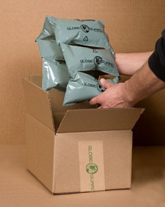 Eco friendly inflatable air bags from Globe Guard, being inserted into a corrugated shipping box