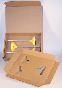Stock mailer with custom die cut insert Stock mailer with custom die cut insert